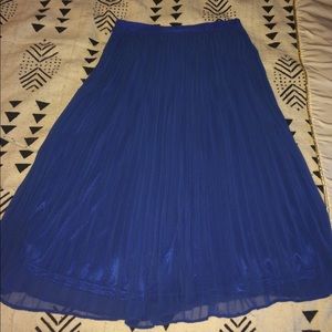 Pleated swing skirt.